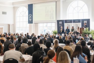Audience listening to speaker at Faith & Ethics presentation